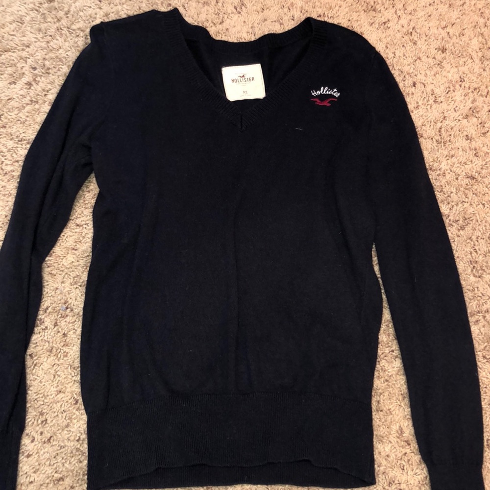 Navy hollister sweater size x-small.